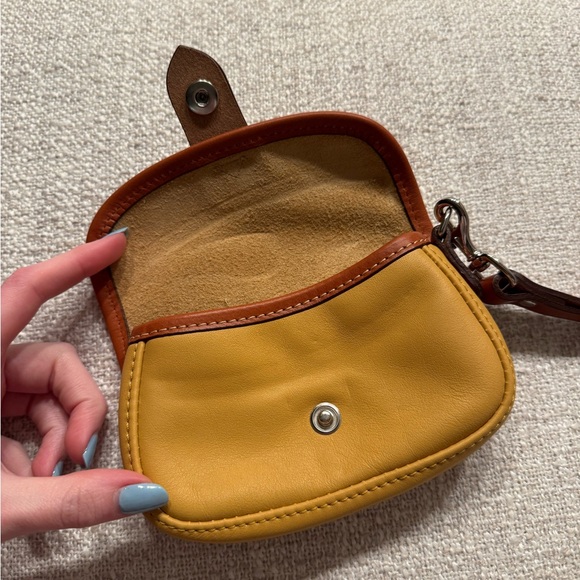Dooney & Bourke Oncour Twist Flap Wristlet - Picture 5 of 6